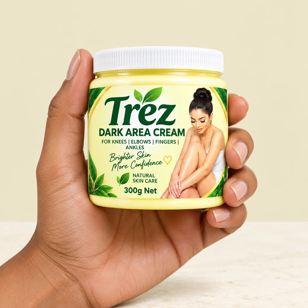 A true hand-scale product photograph: one medium-brown hand naturally holds the sealed exact Trez Da